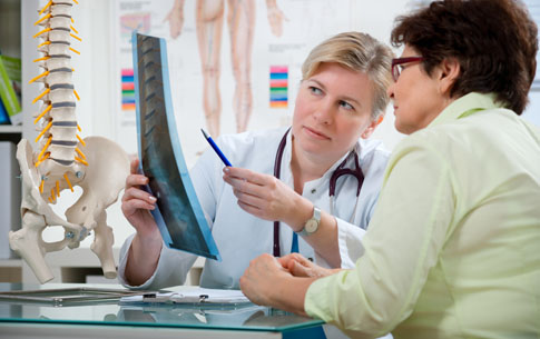 Doctor and patient reviewing xray